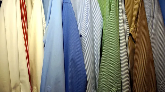 shirt, clothing, clothes, textile, design, style, casual, apparel, fashion, wardrobe, man, fabric, collection, hanger, wear, rack, closet, colorful, garment, cotton, cloth, white, variety, outfit, hang, fashionable, male, modern. Garment Durability and Care Comparison Guide